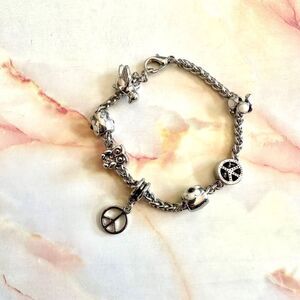 Silver tone bird flower peace owl charm bracelet